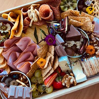 Gourmet grazing platter with cheeses, cured meats, crackers, fruit, nuts and chocolate, delivered to Whitsunday Reflections, Airlie Beach